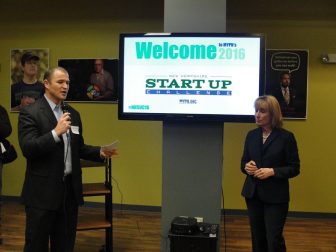 New Hampshire Startup Challenge co-chair Timothy Paradis and Governor Hassan speak to crowds gathered at the Alpha Loft in Manchester back in February when the four-month long business plan competition kicked off. 