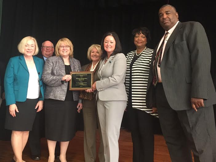 NH Dept of Education Title 1 manager Kathryn Nichol, DOE Deputy Commissioner Paul Leather, MSD superintendent Debra Livingston, NH DOE Commissioner Virginia Barry, P-V principal Amy Allen, and Jennifer Boone and Gordon Duncan from the National Principals Leadership Institute