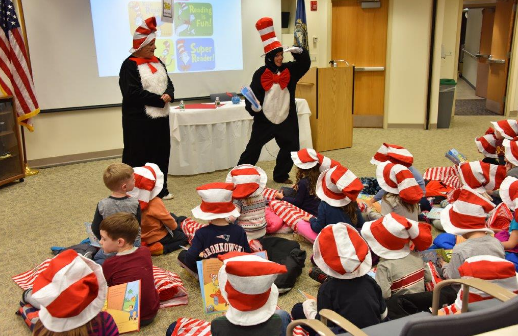 Sharon Vallee and Cathy Poulin from Bob’s Community Outreach team acting out the story for kids at Elliot Child Care.