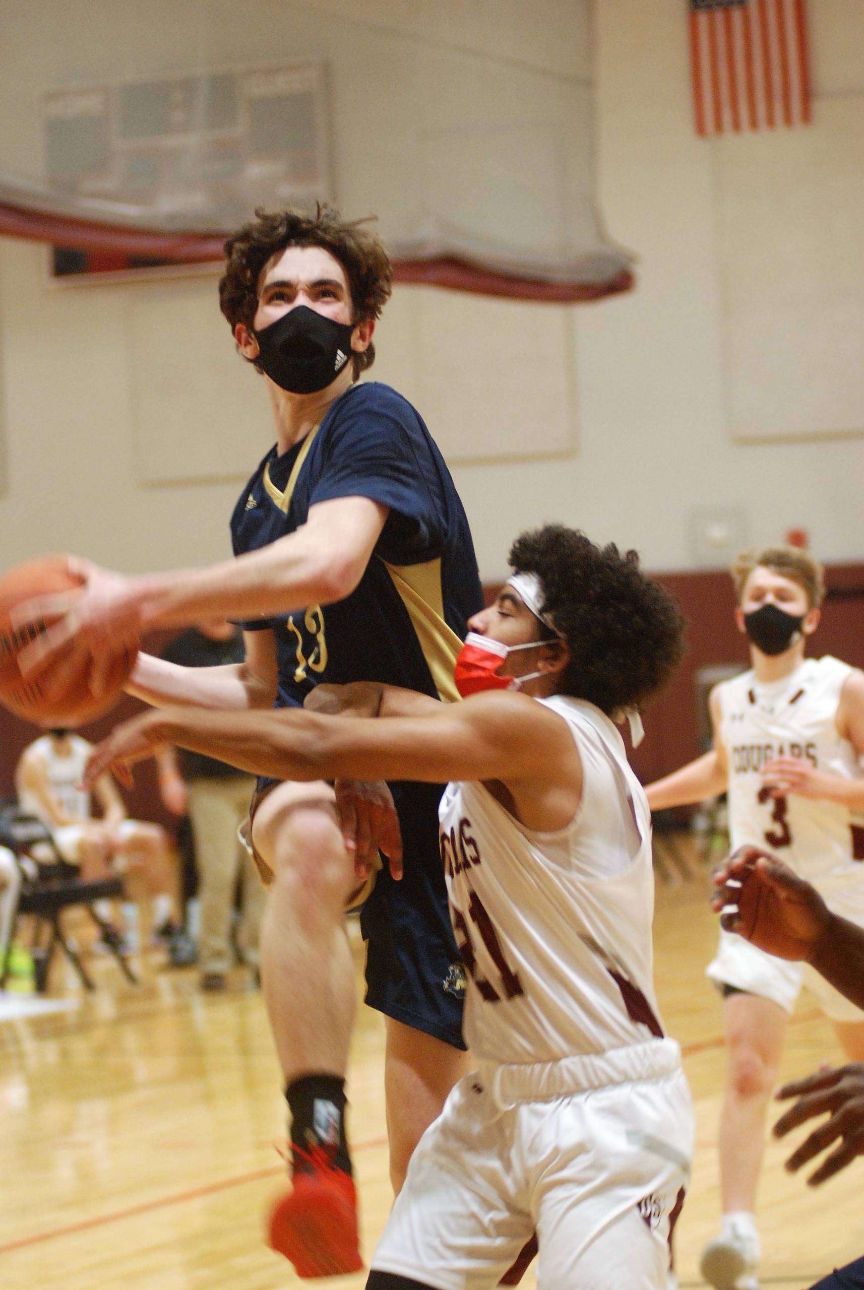 Senior captain Tom Gillis drives the ball to the basket.