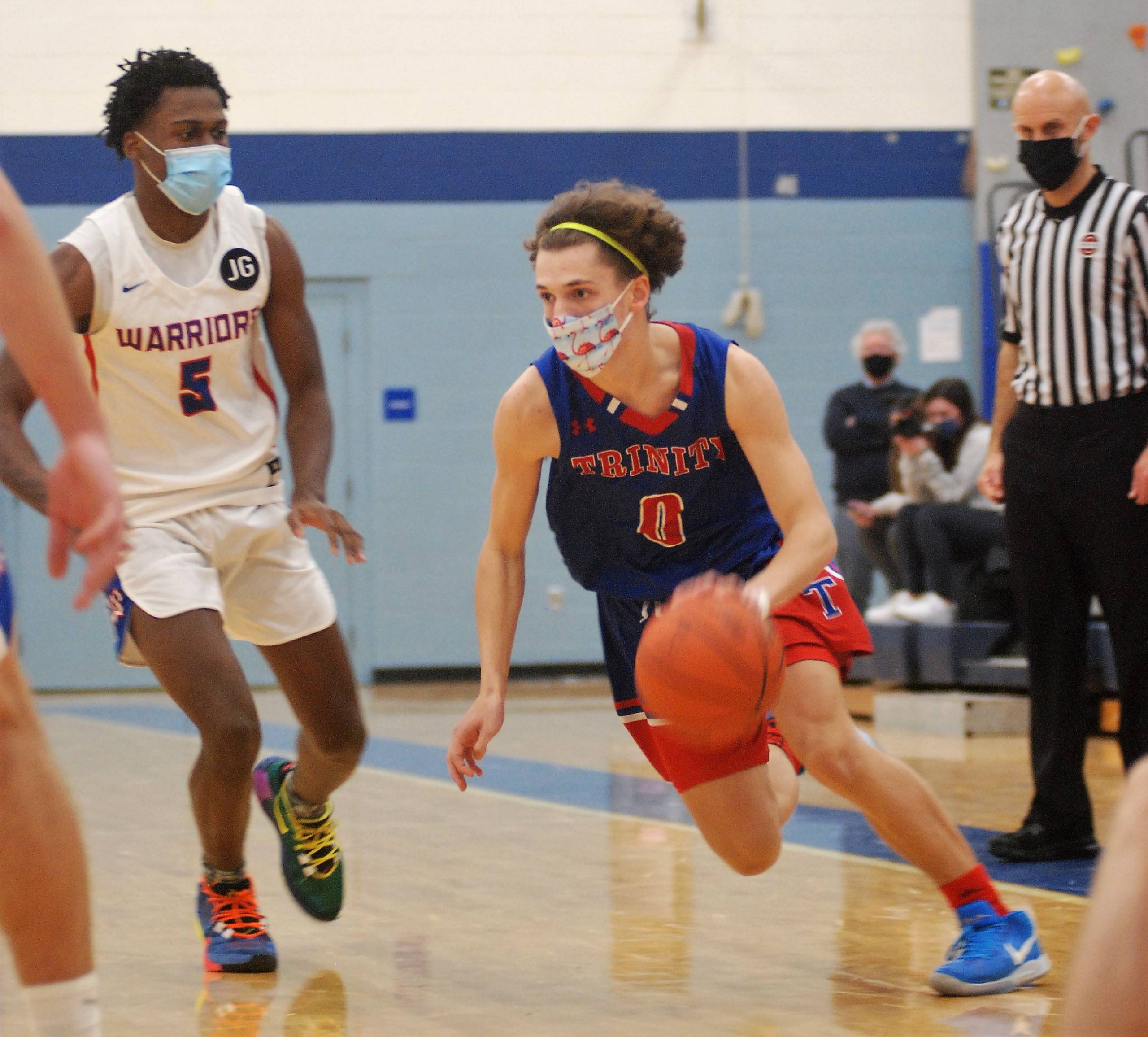 Freshman Tyler Bike drives inside.