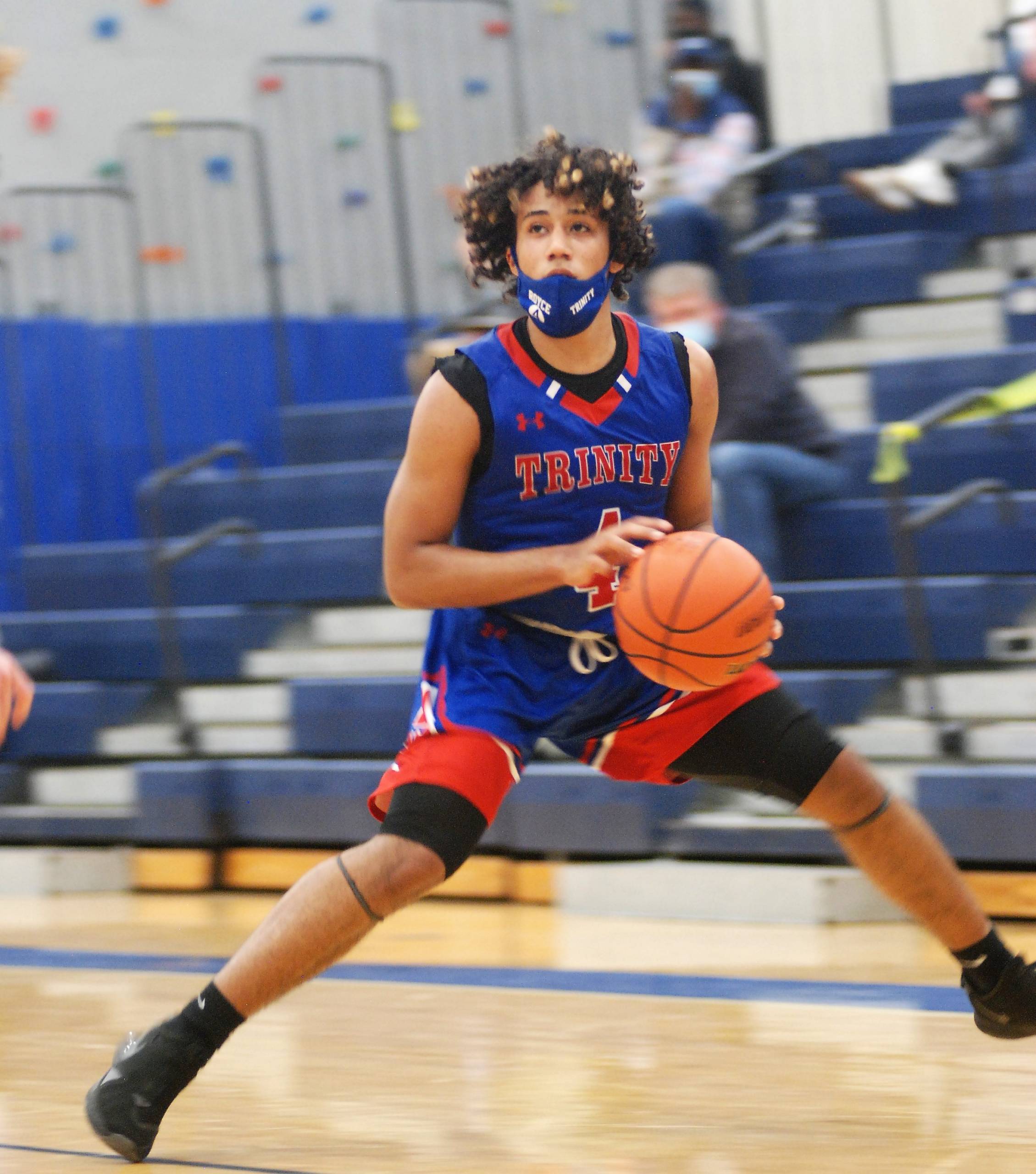 Royce Williams side stepping into a three-point attempt.