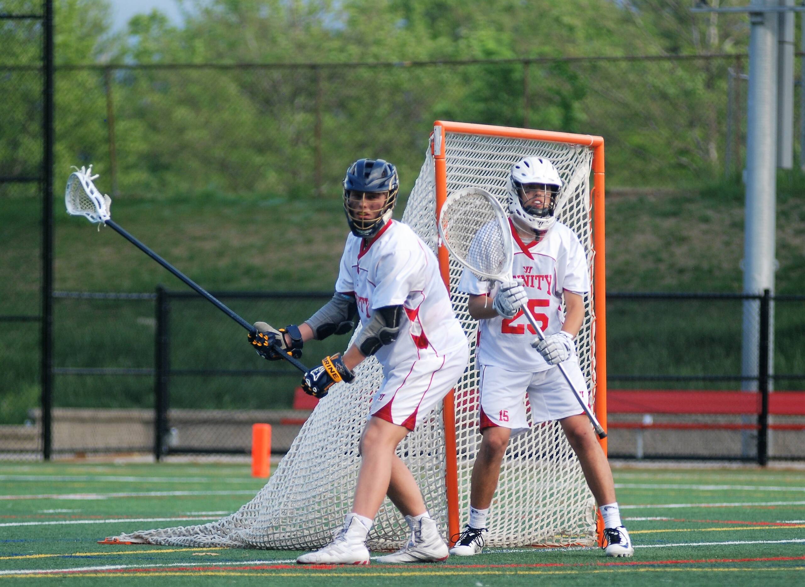 Trinity boys lacrosse players Matt Miclette and Nick Guerra