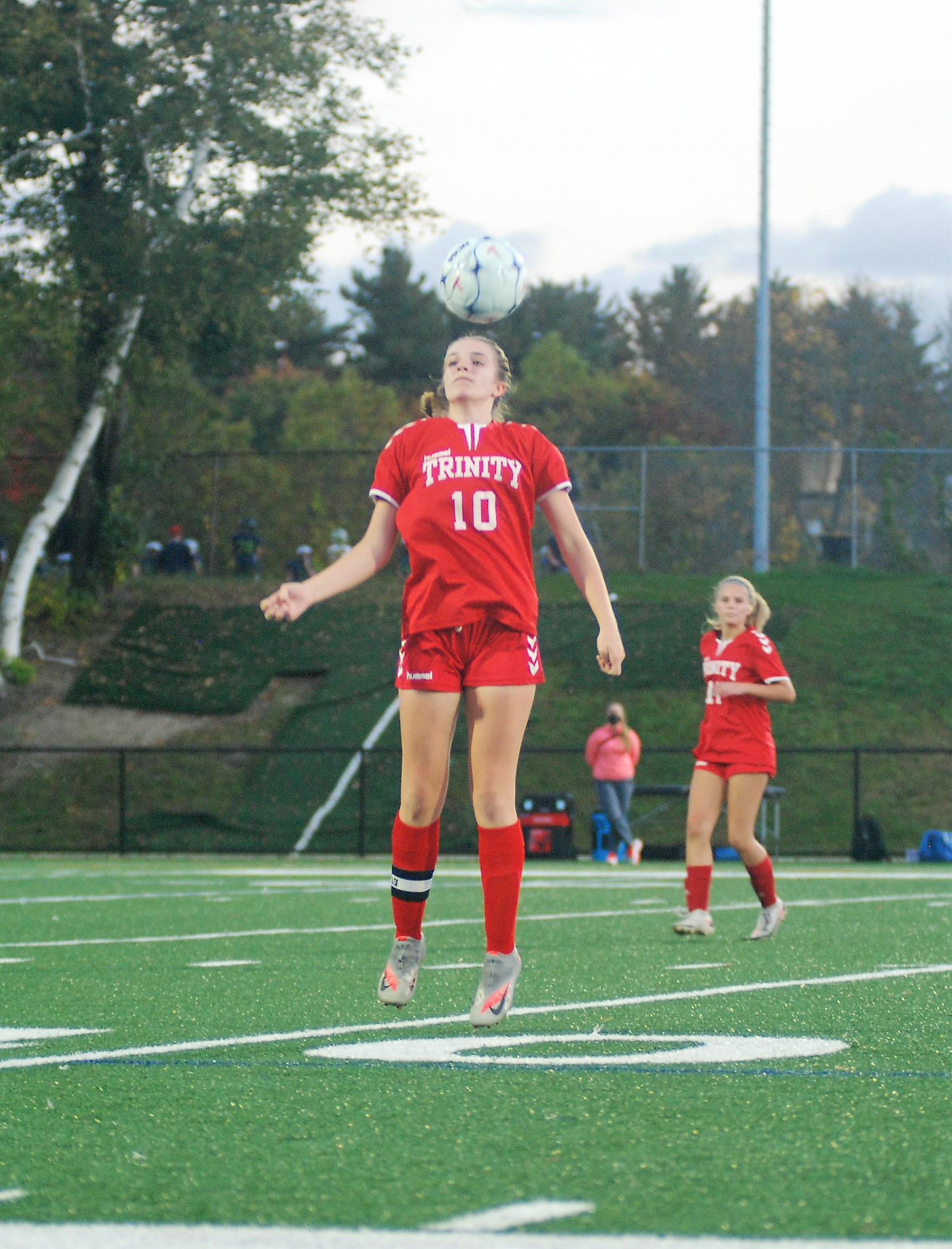 Sarah Bradley heads the ball