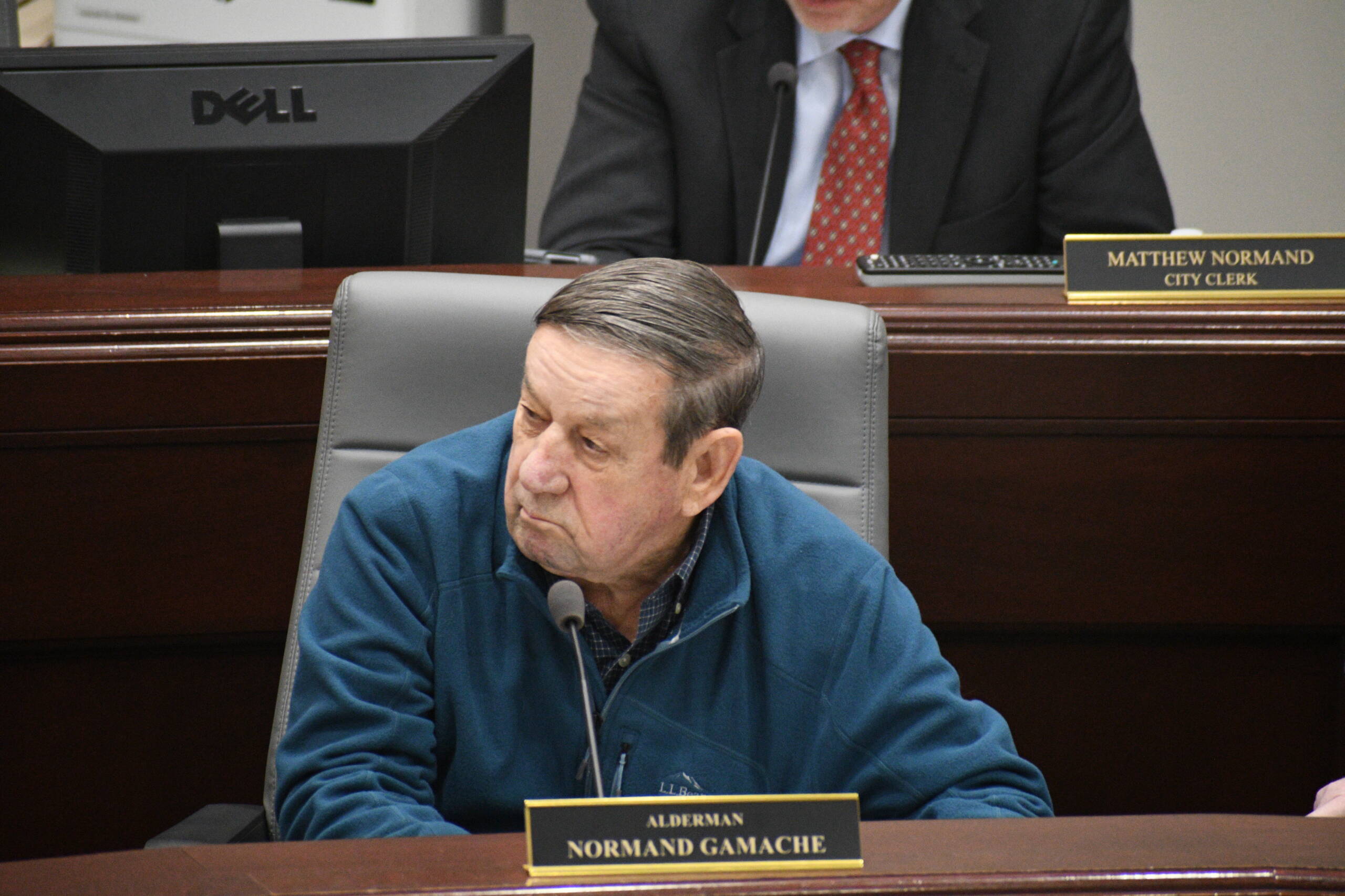 Rick Ladd (R-Haverhill) holds up a list of teacher names and salaries during debate on HB 553. Photo/Andrew Sylvia