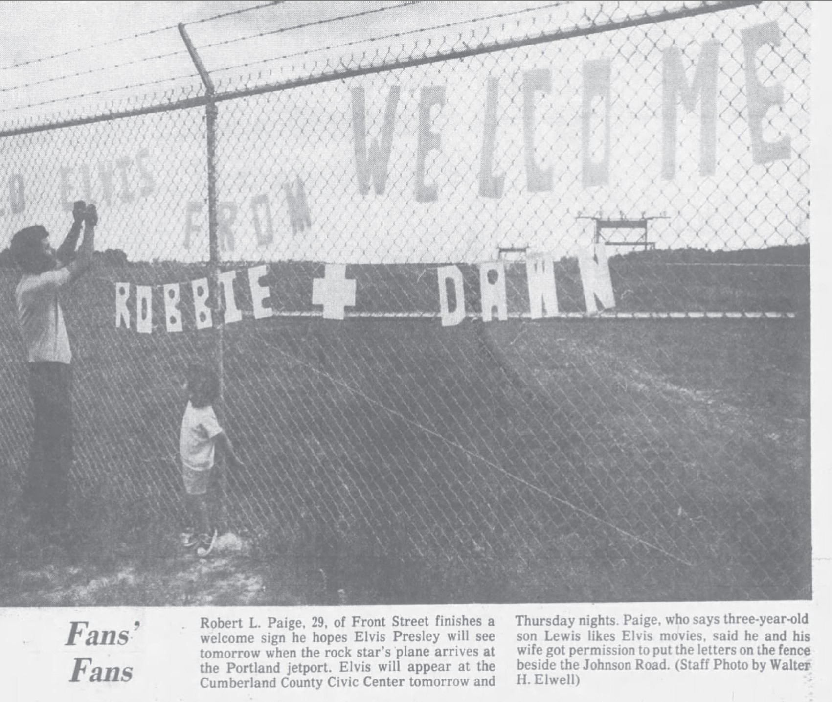 Elvis Presley fan Robert Paige is shown in the Aug. 16 Evening Express putting up a sign to welcome Elvis Presley at the Portland International Airport for his Aug. 17 and 18 shows. By the time the newspaper came out that afternoon, Presley was dead. (Portland Evening Express image)