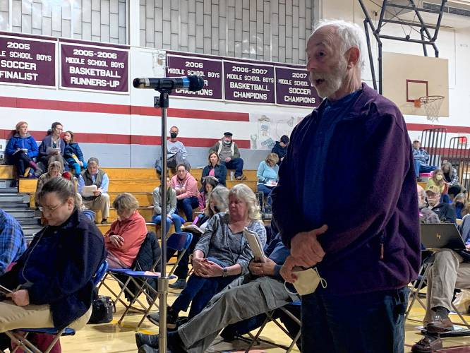 Jeff Stone of Wilton speaking on a warrant articles at Wilton's Town Meeting in March 2022 in the gymnasium of the Wilton-Lyndeborough Cooperative Middle/High School. Monadnock Ledger Transcript