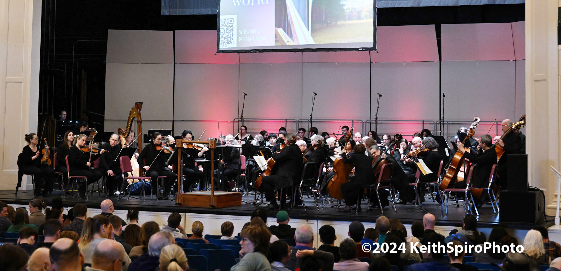Photo of symphonic orchestra on stage. photo by Keith Spiro
