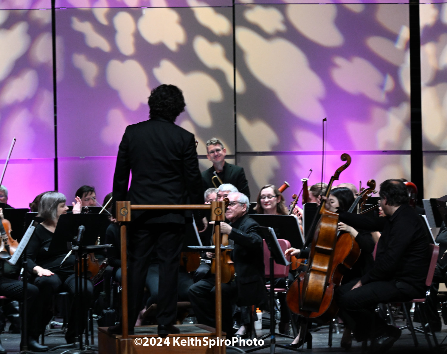 Image of trumpet player receiving accolades. Photo by Keith Spiro