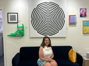 See Saw Art Gallery owner Amy Regan in a photograph of her gallery.