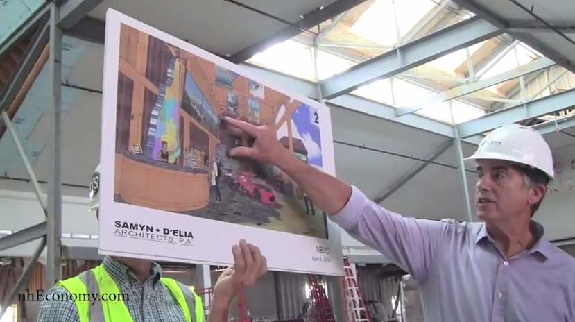 Ward D'Elia describes the interior of the new state welcome center beyond the Hooksett tolls.