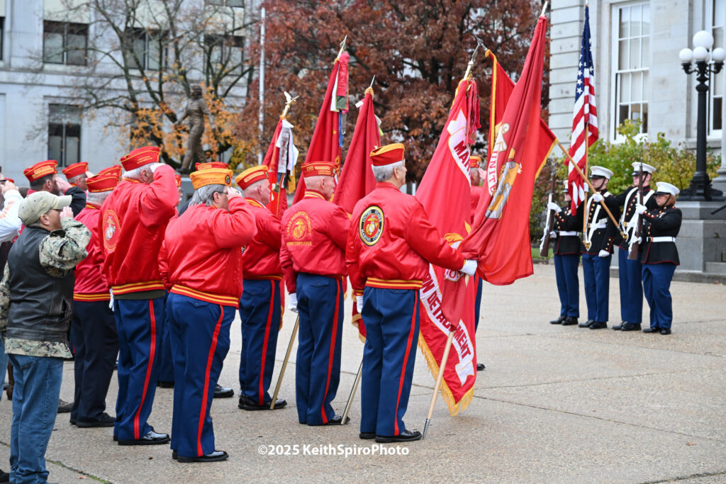 Marine Corps active and retired perform ceremonial presentation of the colors in this photo by Keith Spiro. At the NH State House Nov 10, 2025