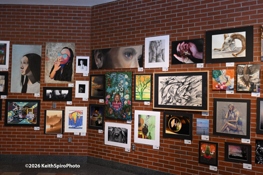 this is a Keith Spiro photo that depicts an entire wall of the work of Scholastic Art winners  
