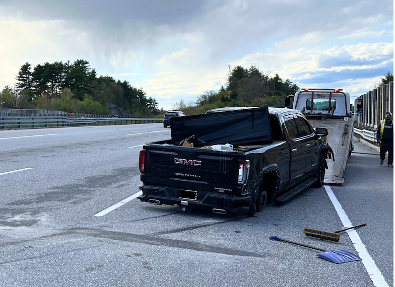 Mass. driver charged following crash after state police say he tossed firearm from truck